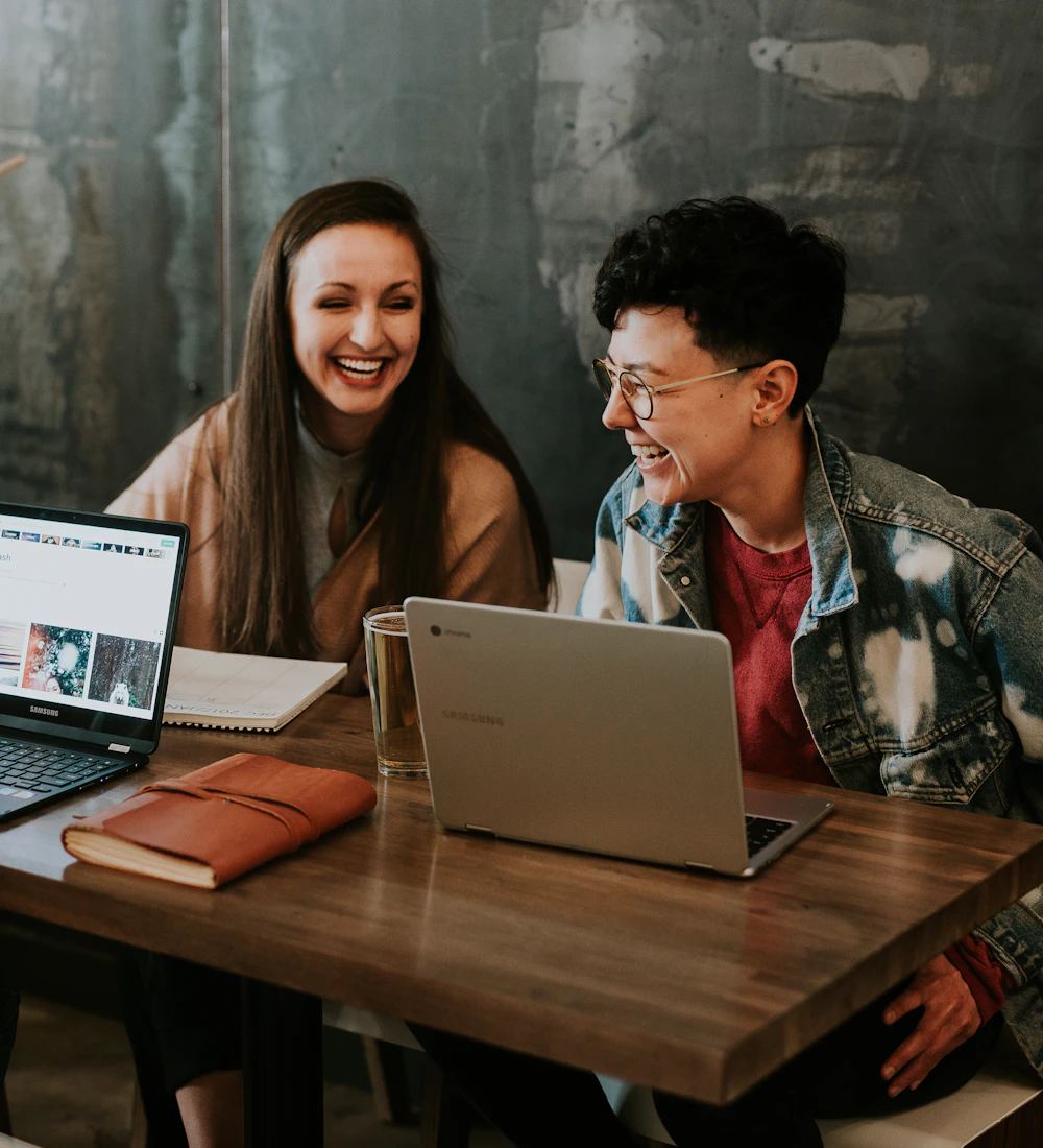 Small team working together on laptops